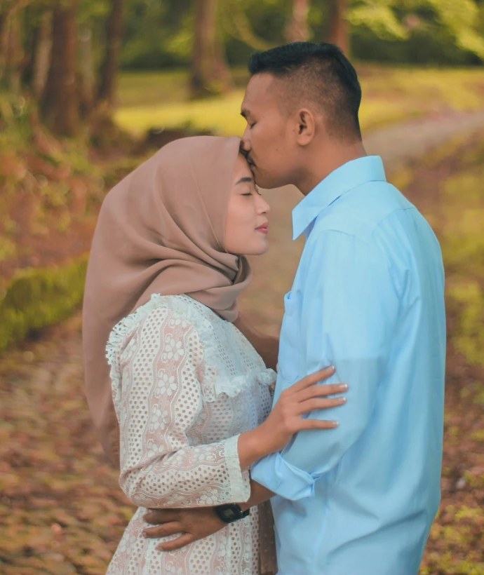 a man and woman kissing